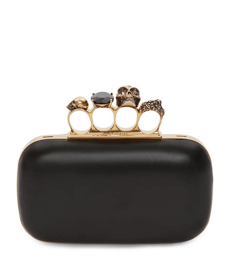 alexander mcqueen skull clutch.